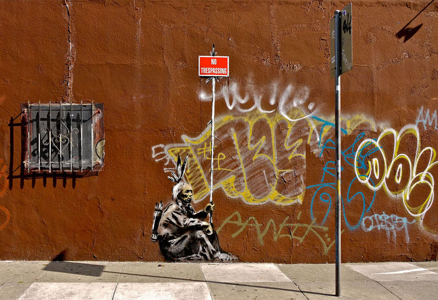 Таинственное и скандальное граффити-искусство Бэнкси