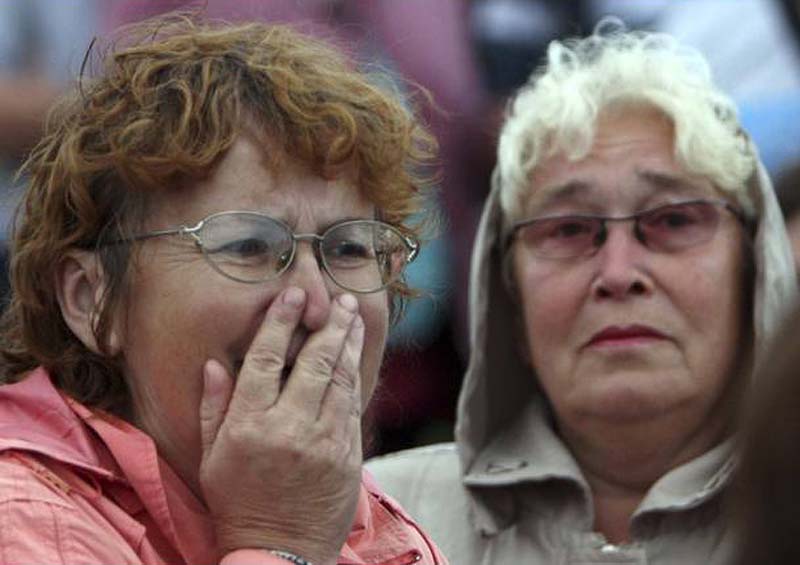 83600300 woman reacts Трагедия на Волге: затонул теплоход Булгария