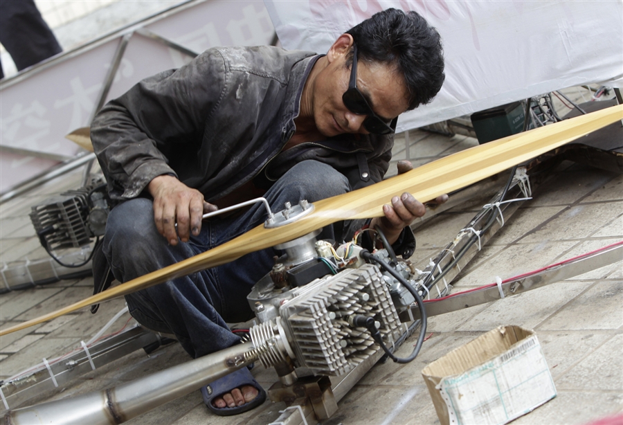 Фотография: Китайский крестьянин построил летающую тарелку №9 - BigPicture.ru