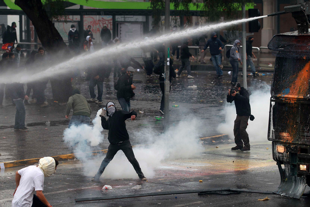 Фотография: Массовые протесты в Чили №28 - BigPicture.ru