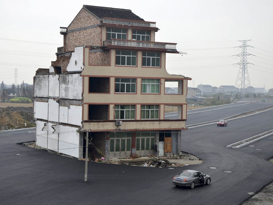 Фотография: Борьба китайских властей и владельцев старых домов №2 - BigPicture.ru