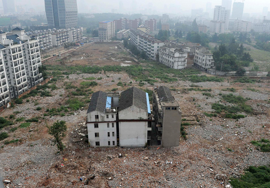 Фотография: Борьба китайских властей и владельцев старых домов №6 - BigPicture.ru