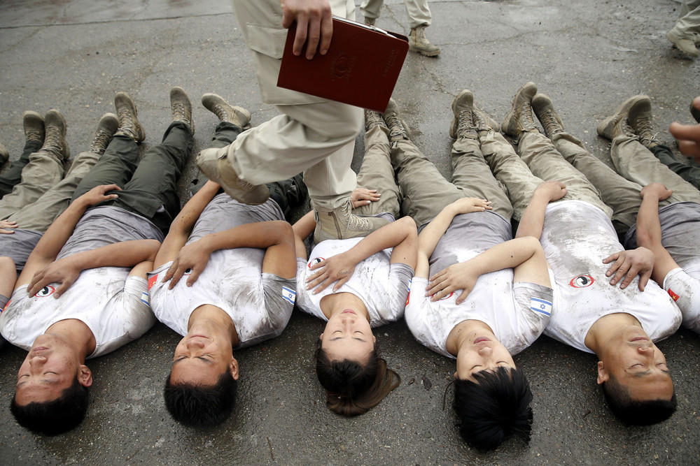 Фотография: Как готовят элитных девушек-телохранителей в Китае №6 - BigPicture.ru