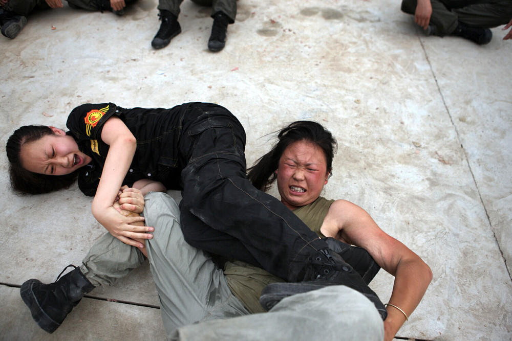 Фотография: Как готовят элитных девушек-телохранителей в Китае №9 - BigPicture.ru