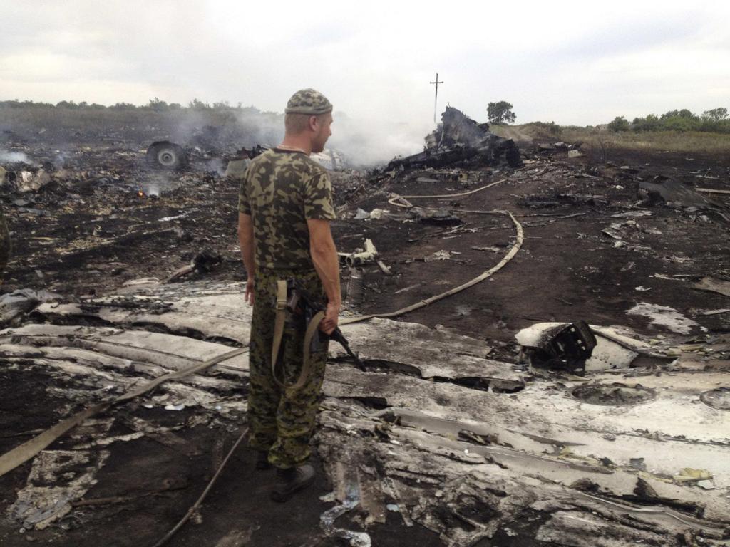 Фотография: На территории Украины был сбит Boeing 777, который летел из Амстердама в Куала-Лумпур №7 - BigPicture.ru