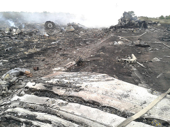 Фотография: На территории Украины был сбит Boeing 777, который летел из Амстердама в Куала-Лумпур №22 - BigPicture.ru