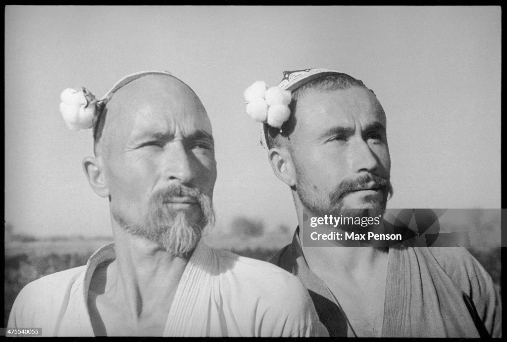 Two cotton growers, 1950's. (photo by max penson/getty images)