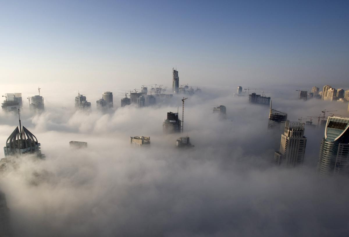 Фотография: Головокружительные и завораживающие фотографии: города в облаках №2 - BigPicture.ru