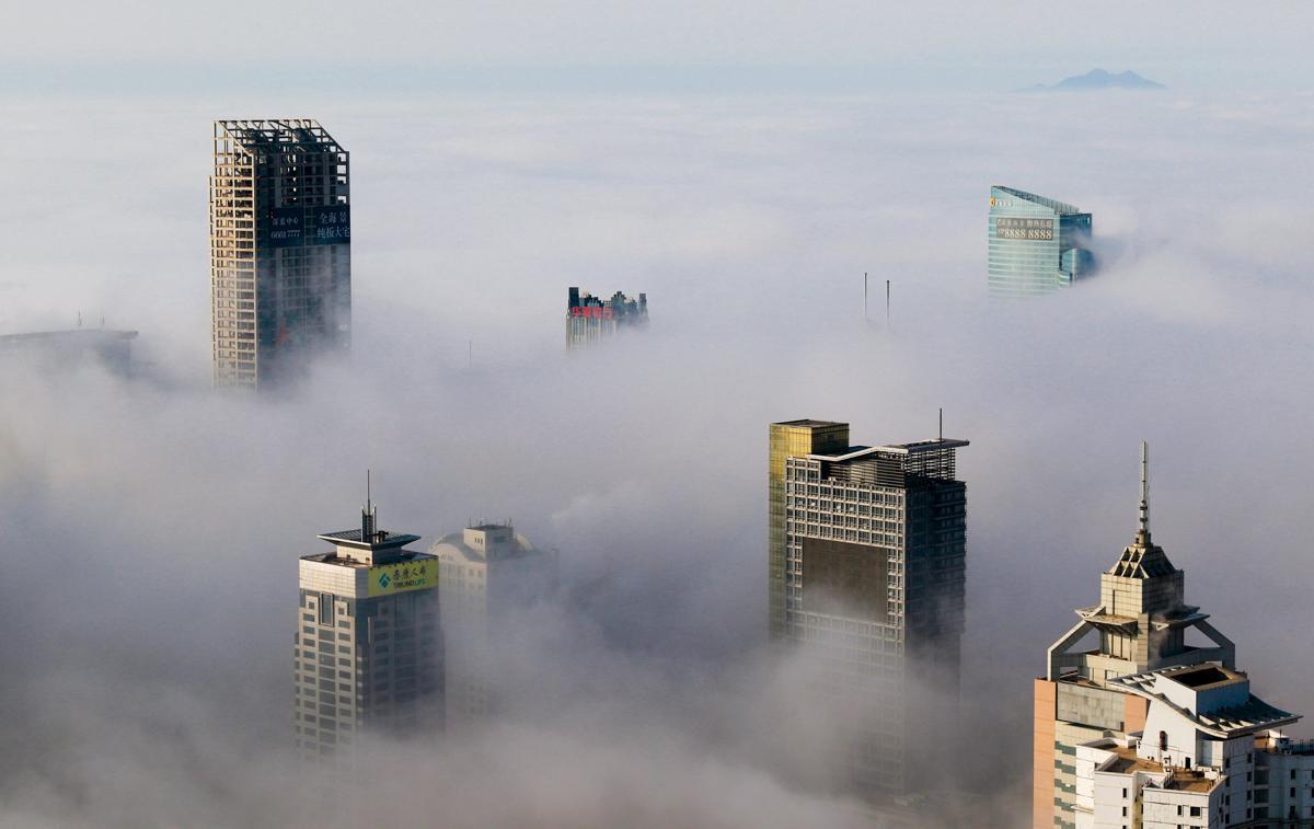 Фотография: Головокружительные и завораживающие фотографии: города в облаках №4 - BigPicture.ru
