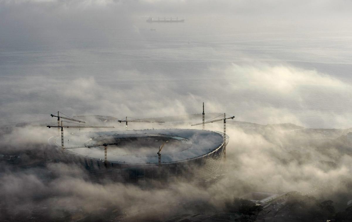 Фотография: Головокружительные и завораживающие фотографии: города в облаках №6 - BigPicture.ru