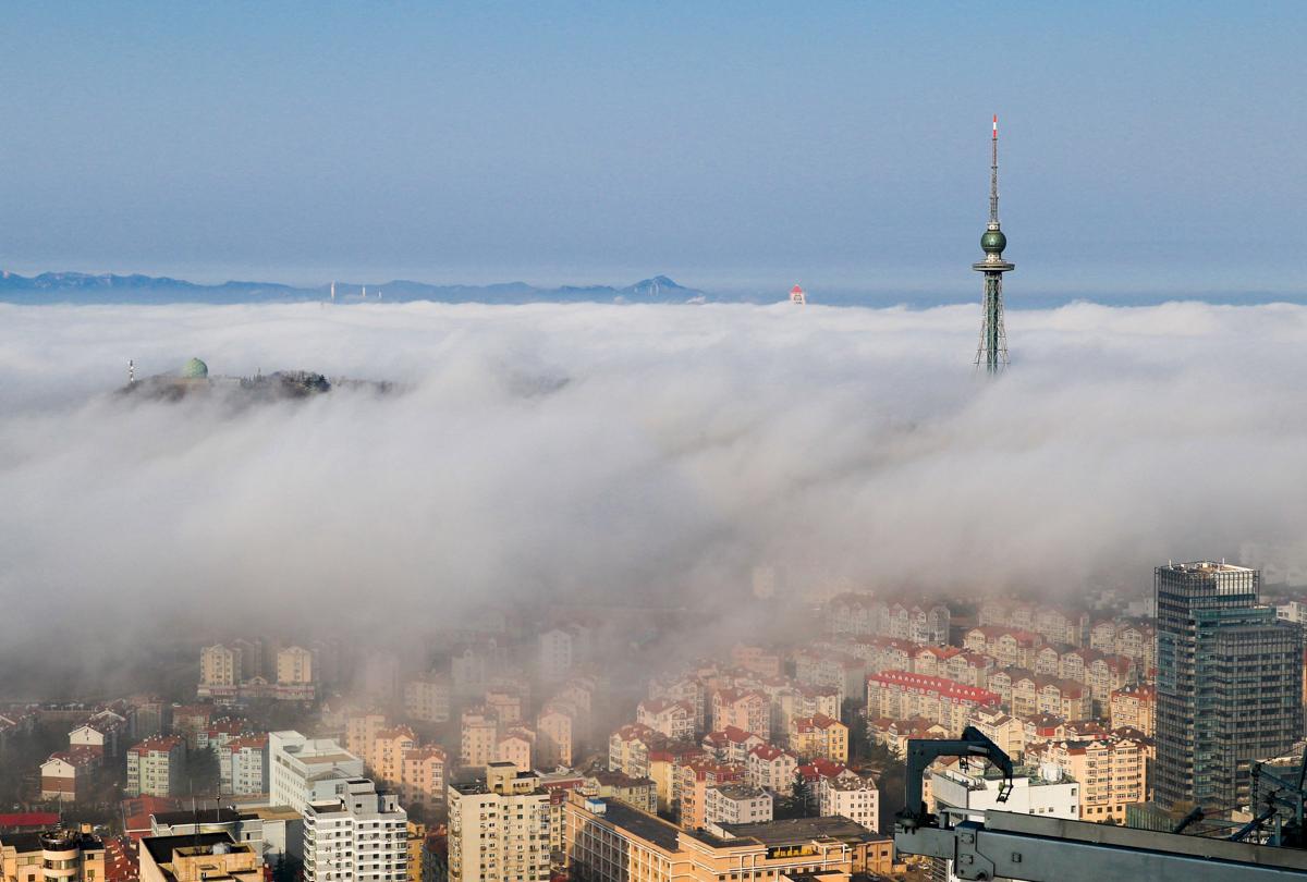 Фотография: Головокружительные и завораживающие фотографии: города в облаках №8 - BigPicture.ru