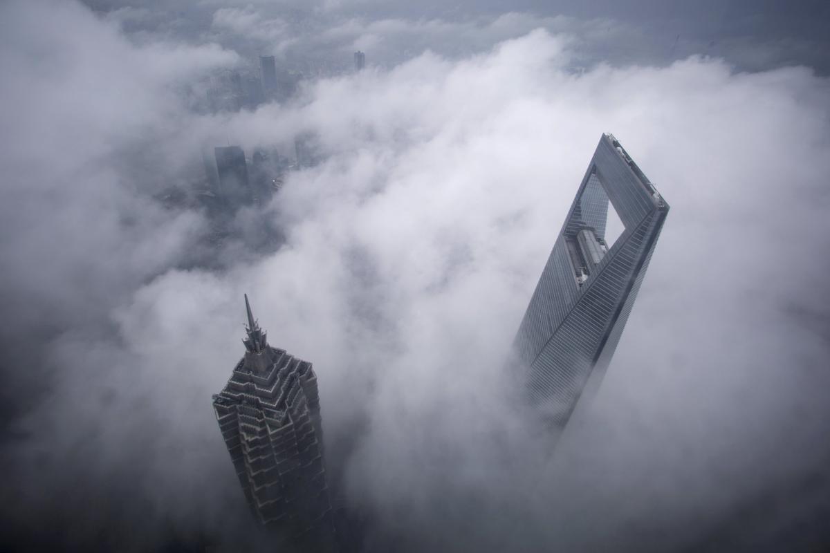 Фотография: Головокружительные и завораживающие фотографии: города в облаках №12 - BigPicture.ru