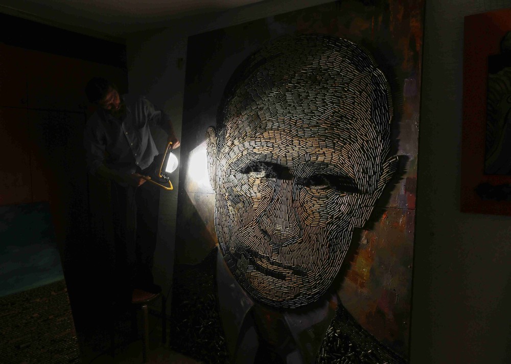 Фотография: Украинская художница делает портрет Путина из патронов №9 - BigPicture.ru