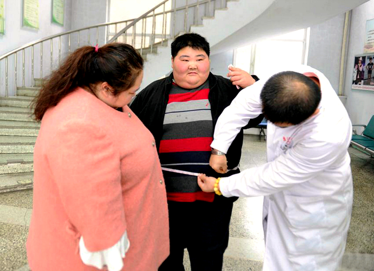 Фотография: Самая толстая пара Китая хочет сбросить вес, чтобы завести ребенка №3 - BigPicture.ru