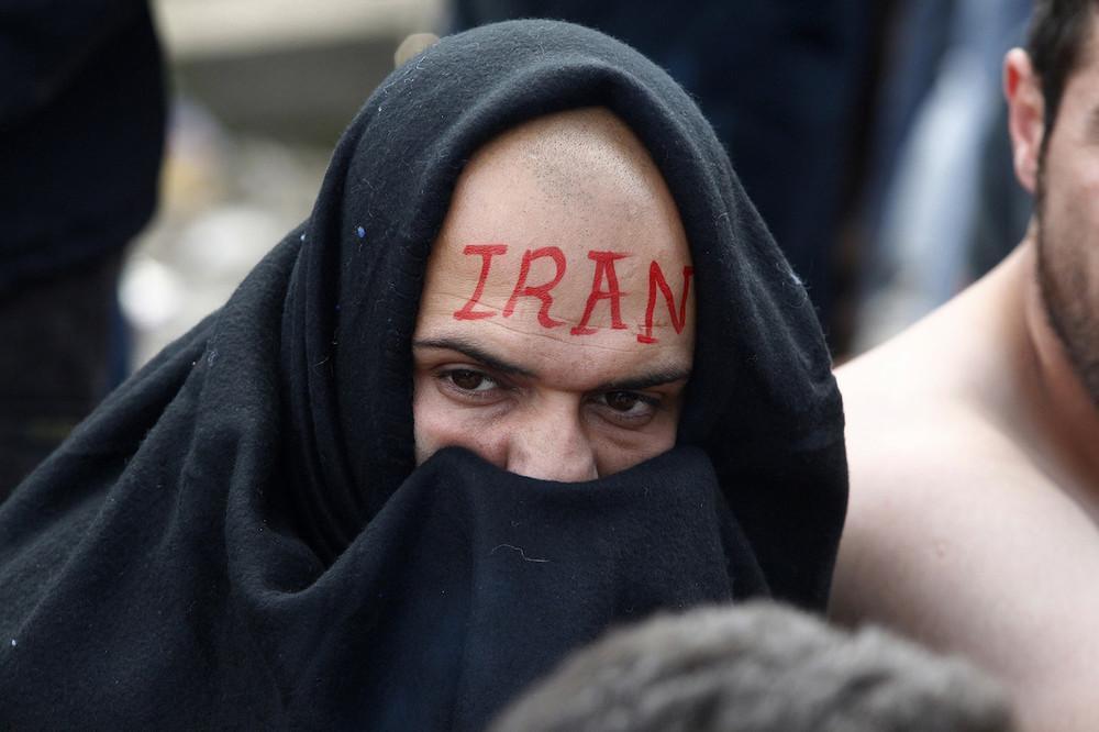 Фотография: Иранские беженцы зашили себе рты №5 - BigPicture.ru