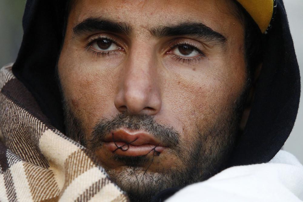 Фотография: Иранские беженцы зашили себе рты №8 - BigPicture.ru