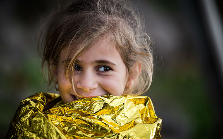 Фотография: Смех сквозь слезы: фотограф запечатлел искренние улыбки беженцев №1 - BigPicture.ru