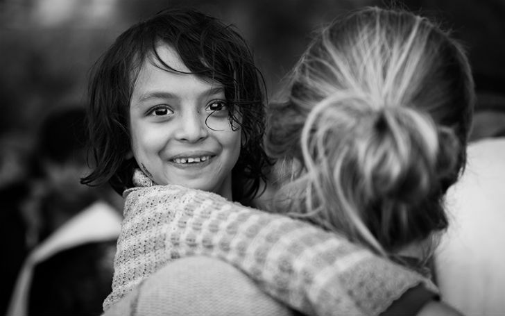 Фотография: Смех сквозь слезы: фотограф запечатлел искренние улыбки беженцев №10 - BigPicture.ru