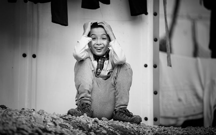 Фотография: Смех сквозь слезы: фотограф запечатлел искренние улыбки беженцев №17 - BigPicture.ru