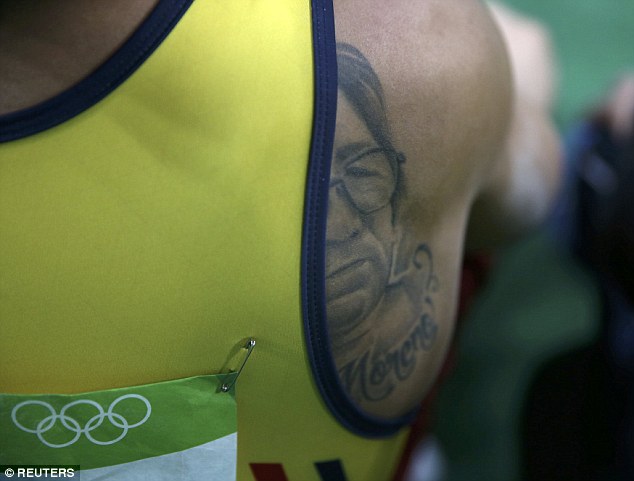 Фотография: Заметки на теле: неожиданные татуировки олимпийских спортсменов №26 - BigPicture.ru