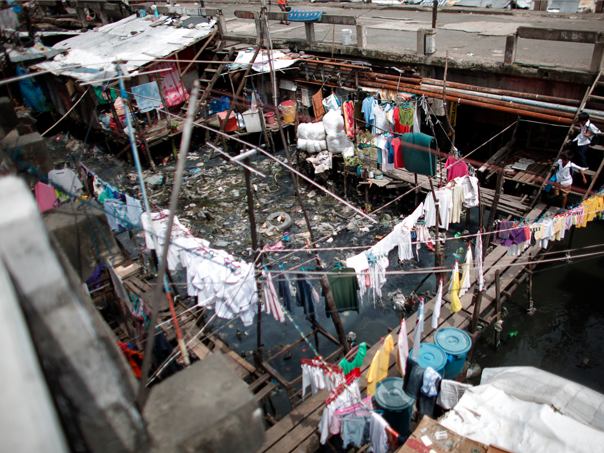 Фотография: Аэрофото трущоб Манилы — самого перенаселенного города в мире №3 - BigPicture.ru