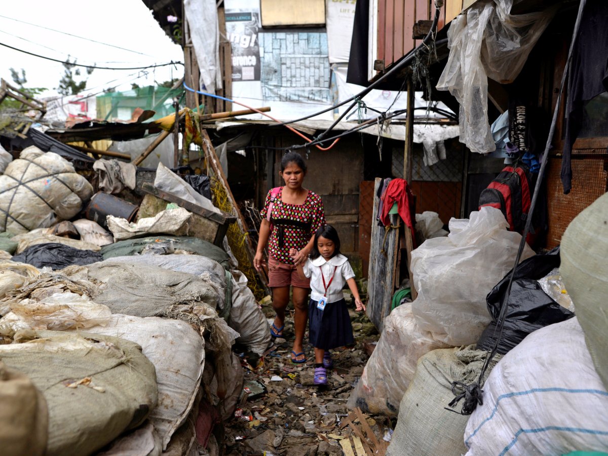 Фотография: Аэрофото трущоб Манилы — самого перенаселенного города в мире №4 - BigPicture.ru