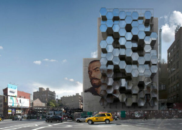 Идея: Поселить бездомных Нью-Йорка в стильных капсулах на стенах зданий