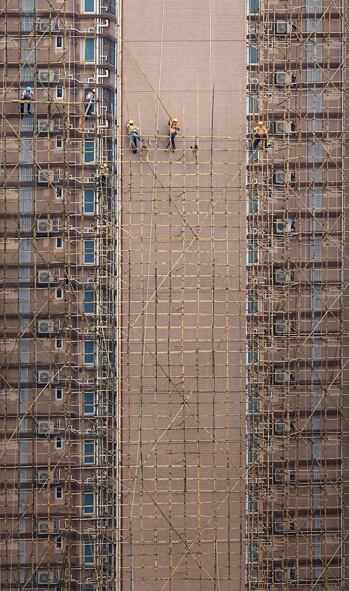 Фотография: Француз подглядывает за жителями Гонконга на крышах небоскребов №4 - BigPicture.ru