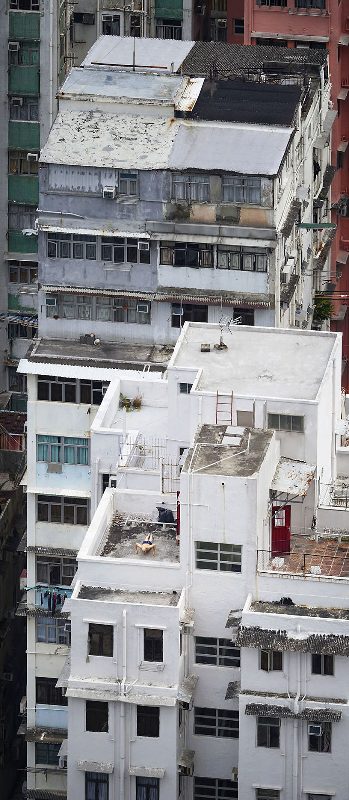 Фотография: Француз подглядывает за жителями Гонконга на крышах небоскребов №5 - BigPicture.ru