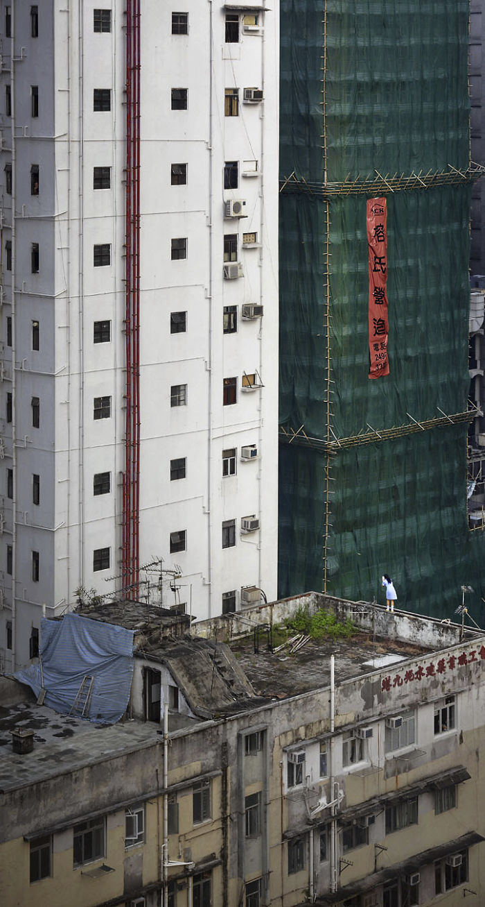 Фотография: Француз подглядывает за жителями Гонконга на крышах небоскребов №9 - BigPicture.ru