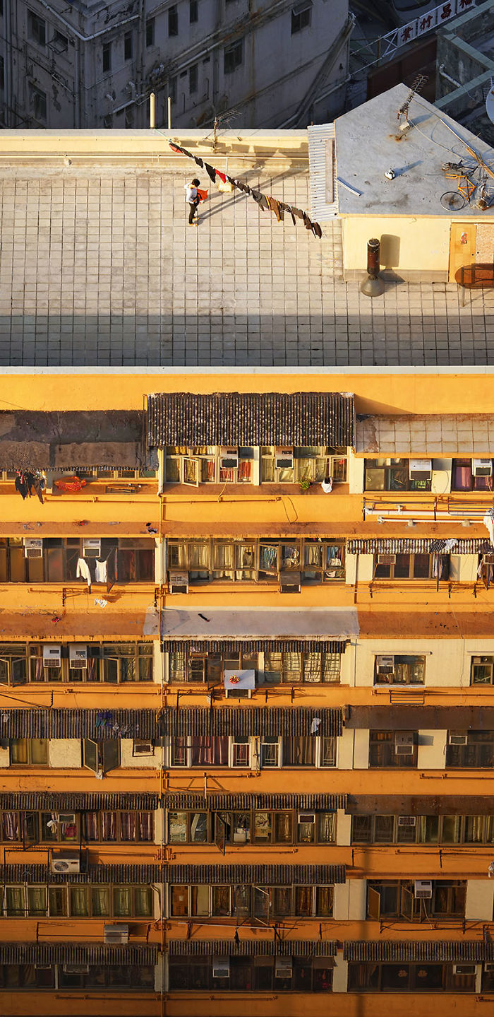 Фотография: Француз подглядывает за жителями Гонконга на крышах небоскребов №10 - BigPicture.ru