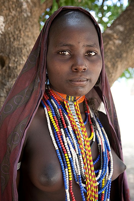 Фотография: Будни африканского народа динка: женщины, не признающие одежду, побежденный рак и буйволы №5 - BigPicture.ru