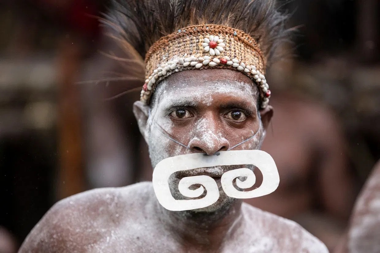 Фотография: Племя людоедов изнутри: каннибалы из Новой Гвинеи, которые съели Рокфеллера 60 лет назад №3 - BigPicture.ru