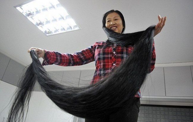 Фотография: Топ-10 обладателей самых длинных волос в мире №9 - BigPicture.ru