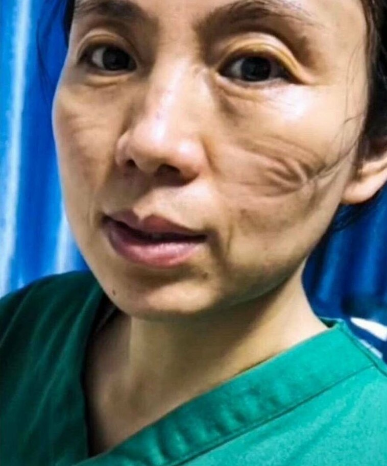 Фотография: Как выглядят лица китайских врачей в конце рабочей смены №6 - BigPicture.ru
