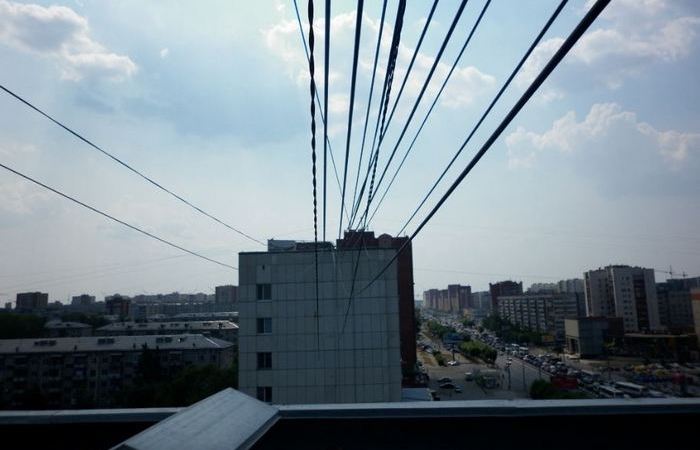 Фотография: Кто и зачем протягивает между домами провода №4 - BigPicture.ru