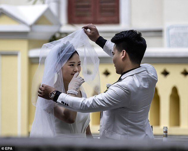 Фотография: В Китае собираются усложнить процедуру развода в надежде, что супруги помирятся №3 - BigPicture.ru