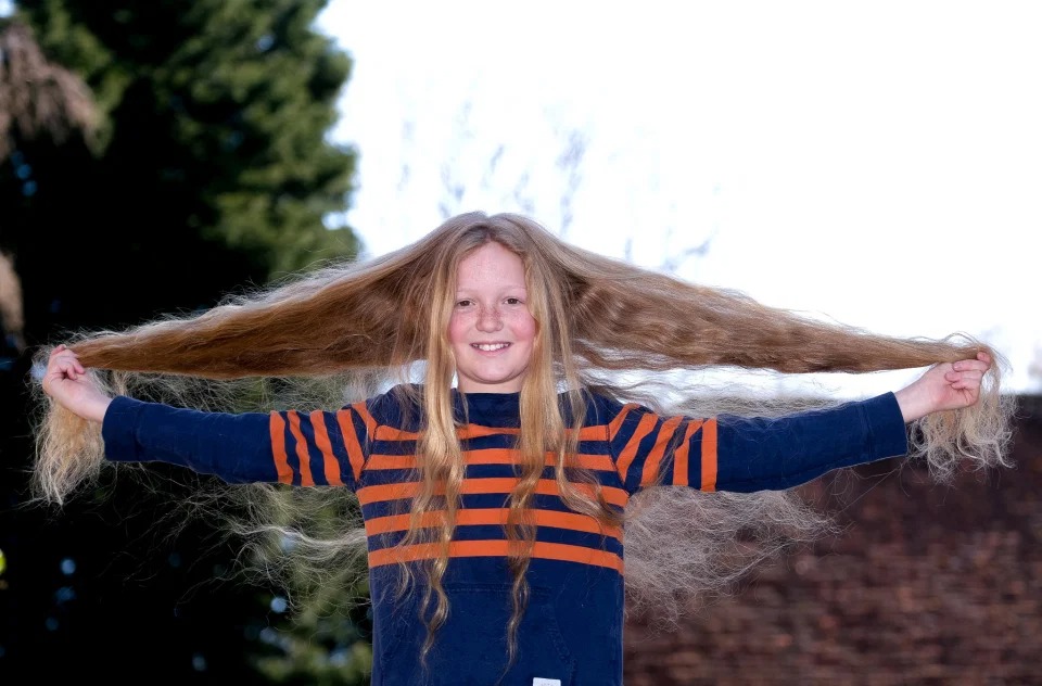Фотография: Зачем этот 12-летний мальчик отрастил такие длинные волосы №1 - BigPicture.ru