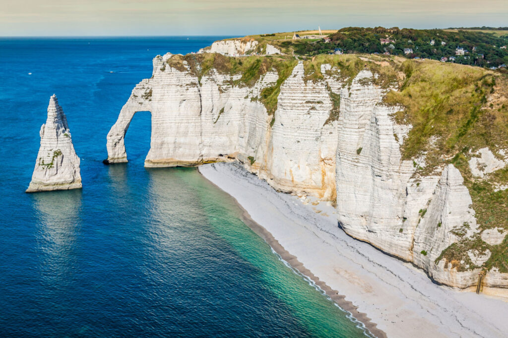The famous cliffs at etretat in normandy, france; shutterstock id 1050732671