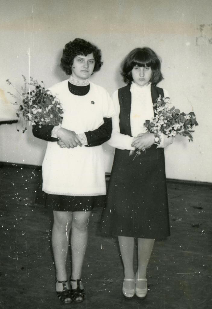 Ussr circa 1970s an antique photo shows two schoolgirl.
