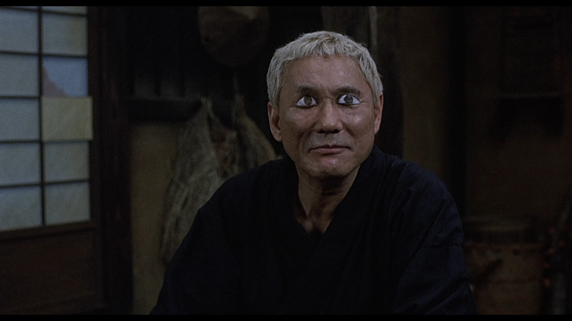 Такеши Китано в роли слепого самурая Затойчи