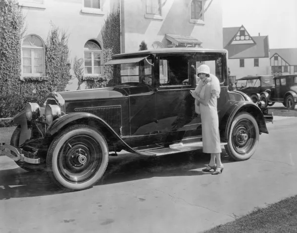 Bigpicture ru depositphotos 12289033 stock photo woman with antique car outside jpg