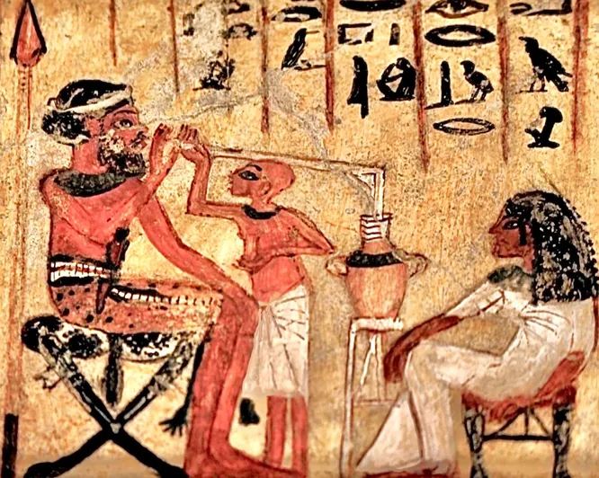 Древнеегипетское изображение человека с соломинкой для питья