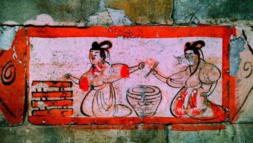 Древнее китайское изображение людей, едящих палочками