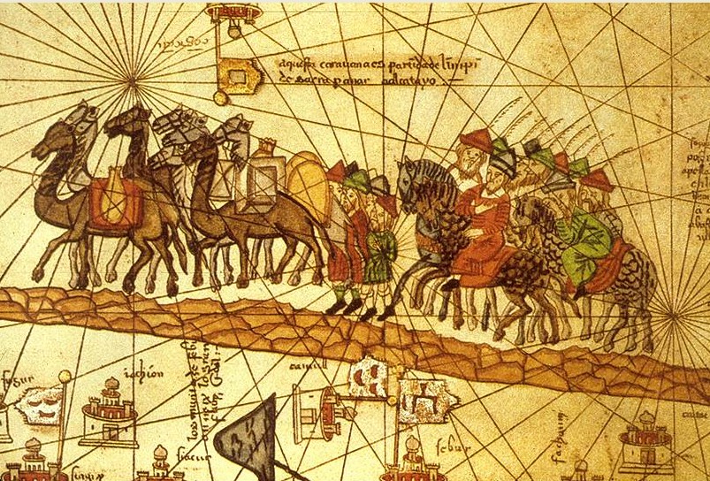 Средневековая миниатюра: торговый караван с верблюдами пересекает пустыню