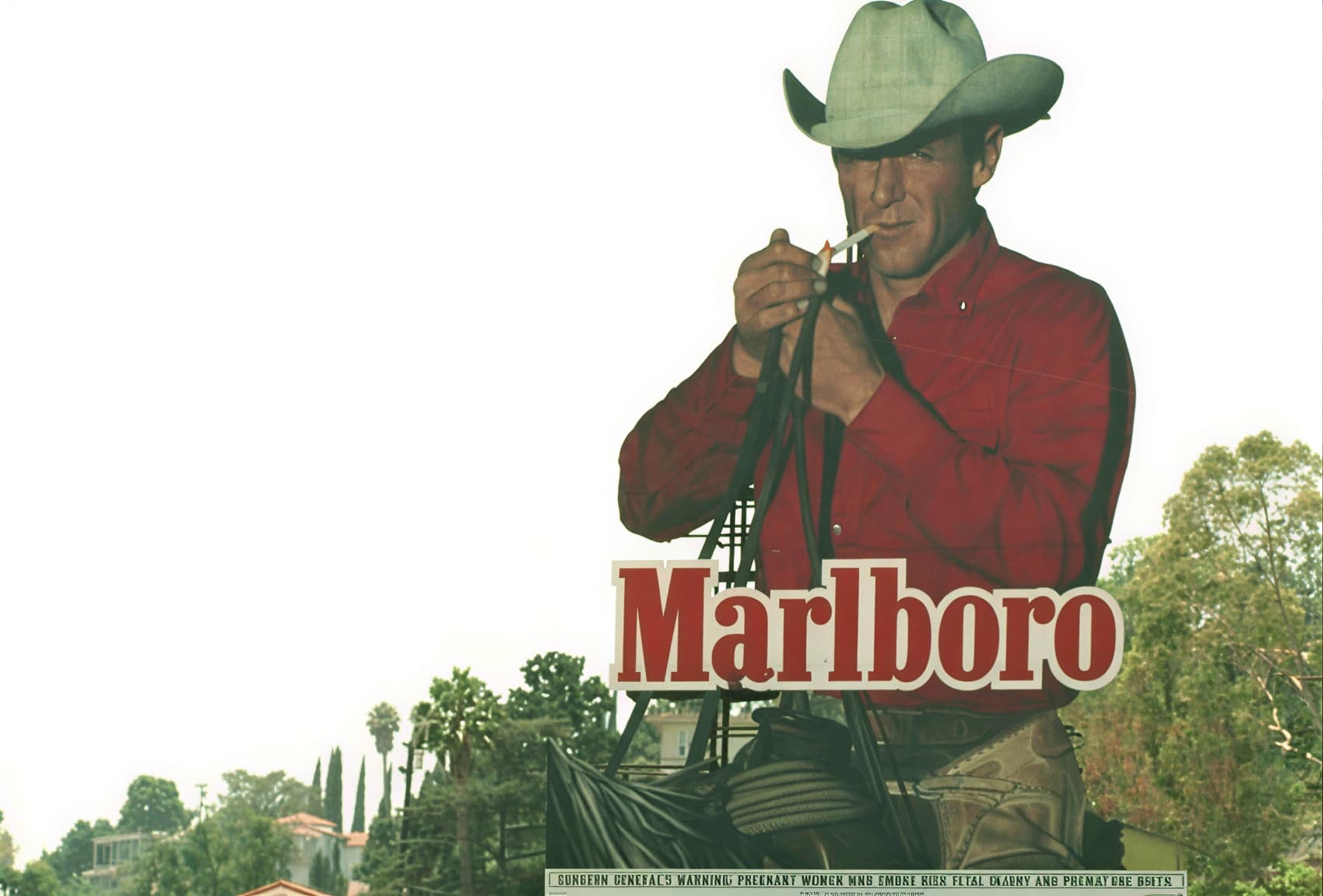 Рекламный биллборд с ковбоем Marlboro на американском шоссе 1960-е