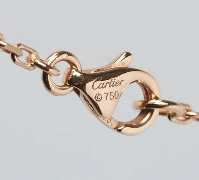 Клеймо на замочке колье Cartier