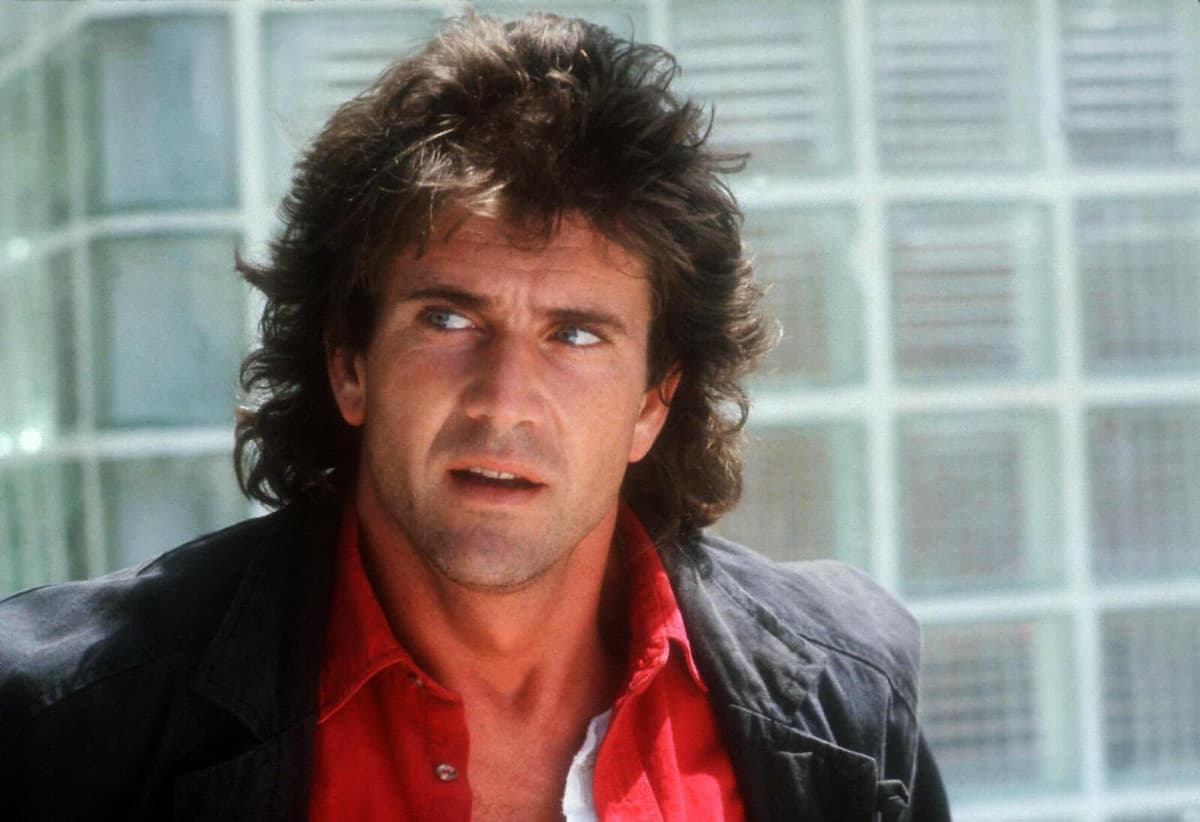 Мэл Гибсон Смертельное оружие 1987 прическа маллет культовая роль Мартин Риггс