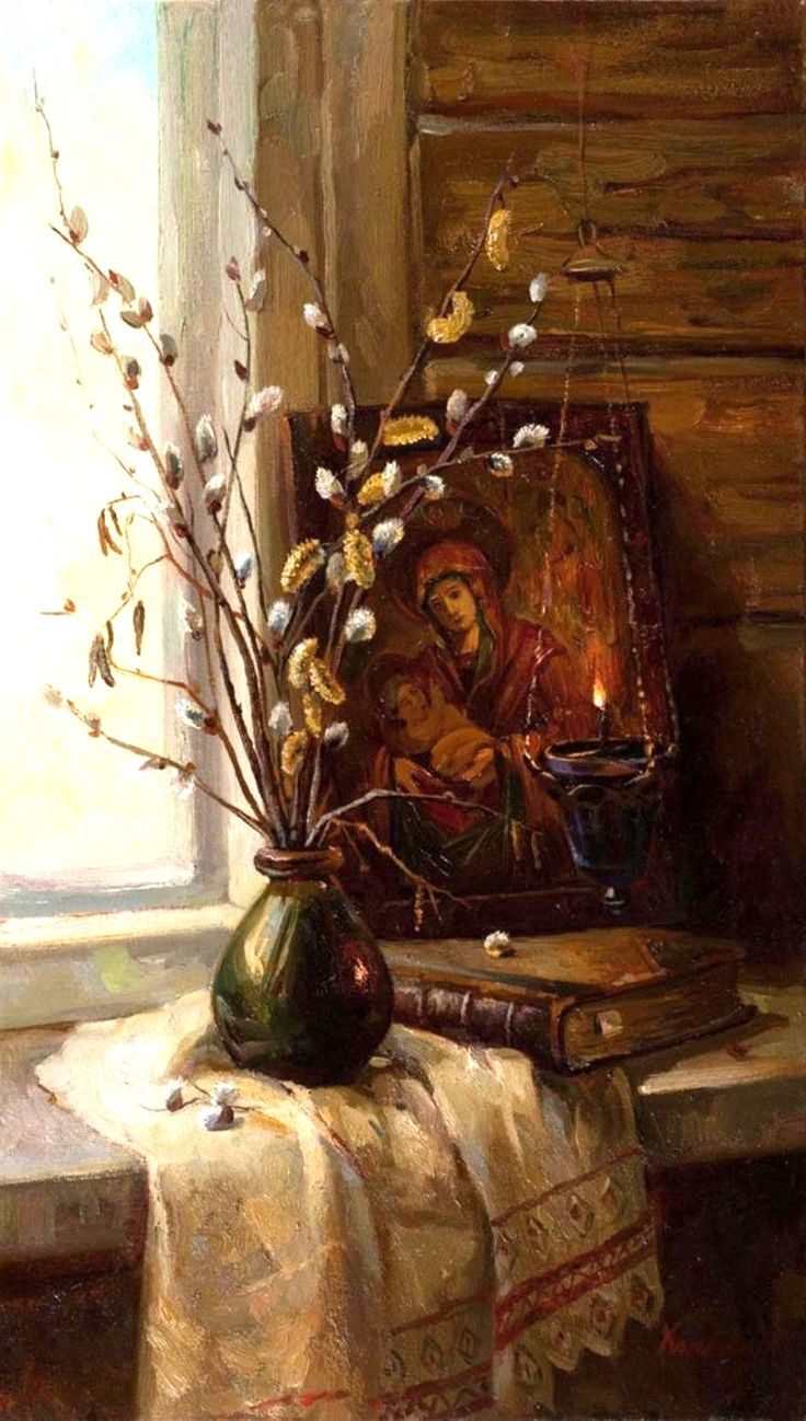 "Православная икона рядом с пучком вербных веток в крестьянском доме