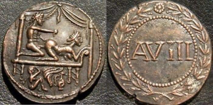 Спинтрия &mdash; бронзовый жетон для расчётов в лупанарии Помпей с изображением любовной сцены